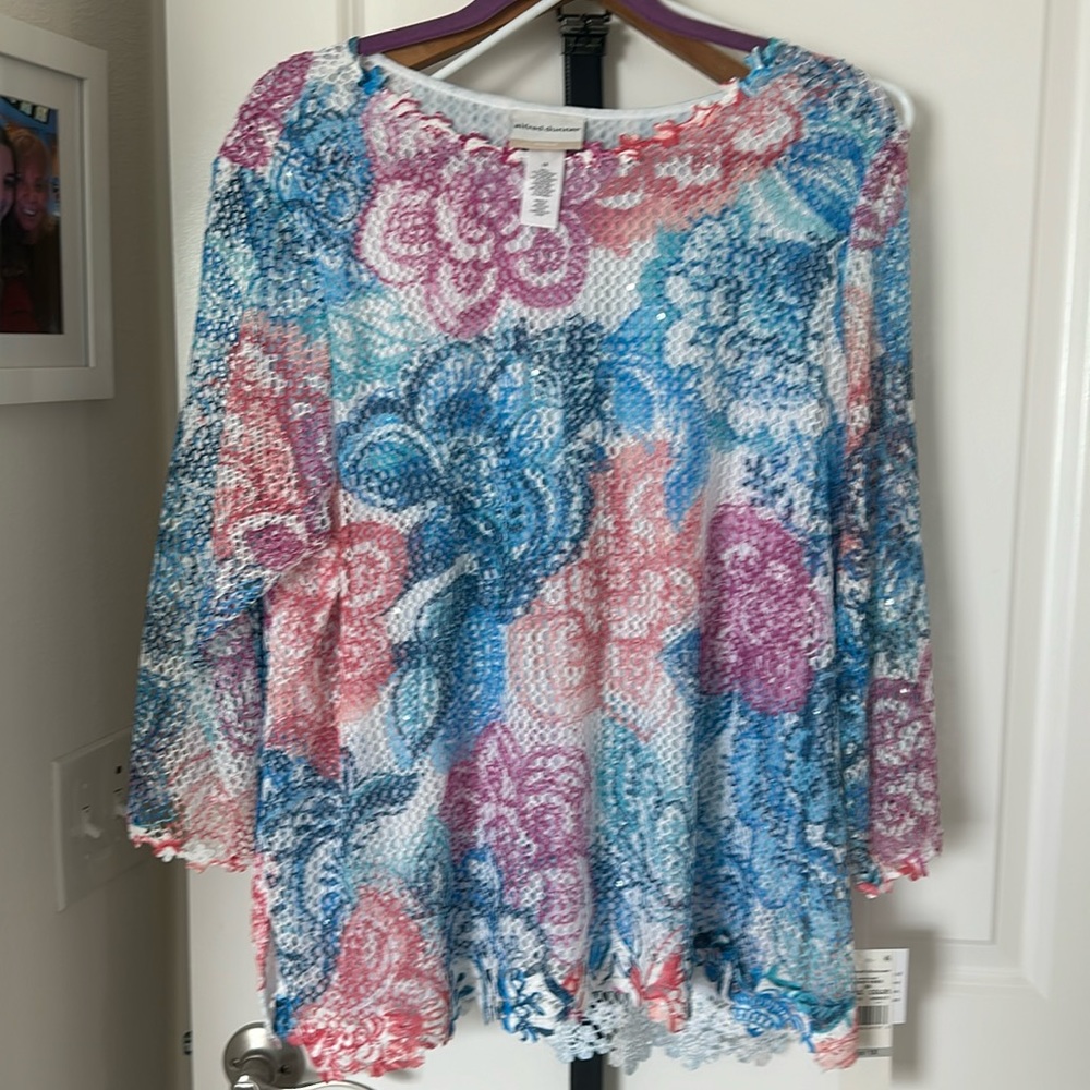Soft multi colored top ,new with tags .,scattered sequence on top